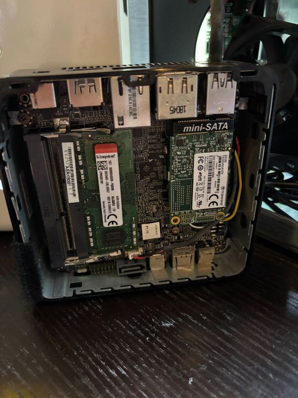 Mini PC opened for a memory and SSD upgrade