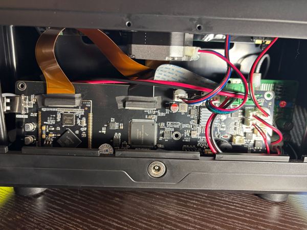 Printer control board and wiring harness during repair