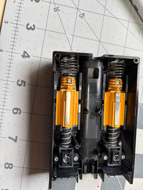 Battery holder repair on a cutting mat