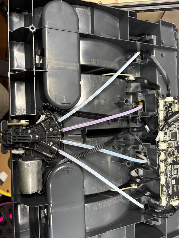 Wiring junction inside a 3D printer being checked