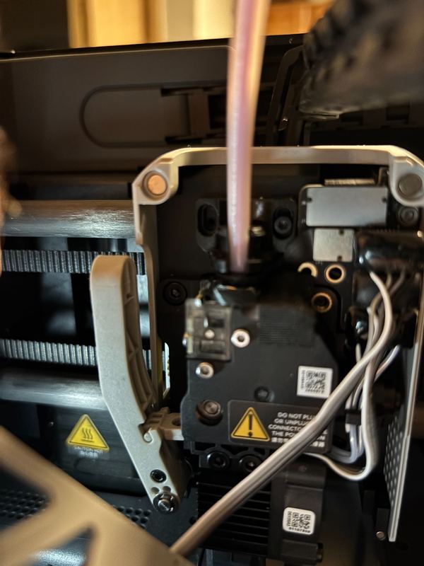Toolhead internals and wiring exposed for repair