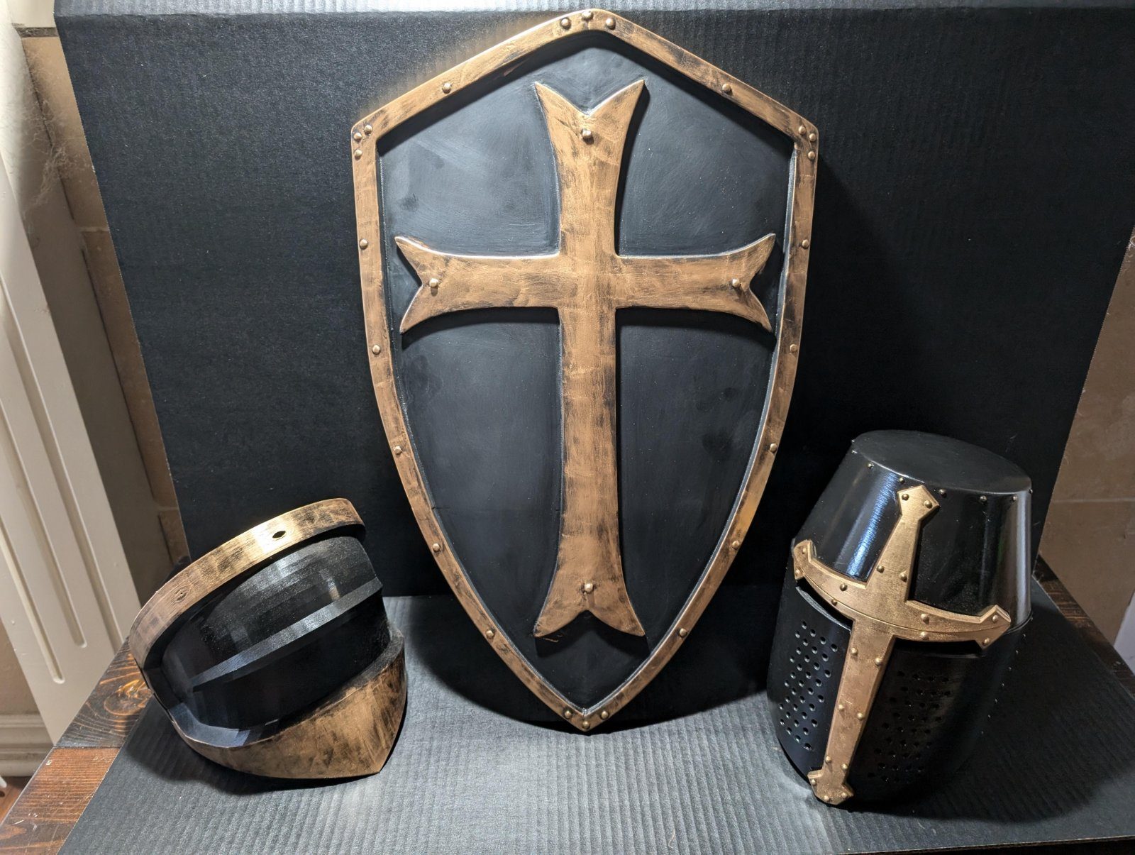 Knight shield and crusader-style helmets 3D printed and finished by NWAMAKER