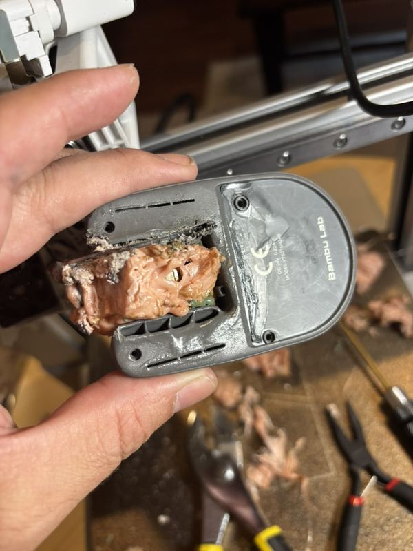 Plastic fused to the inside of the front cover