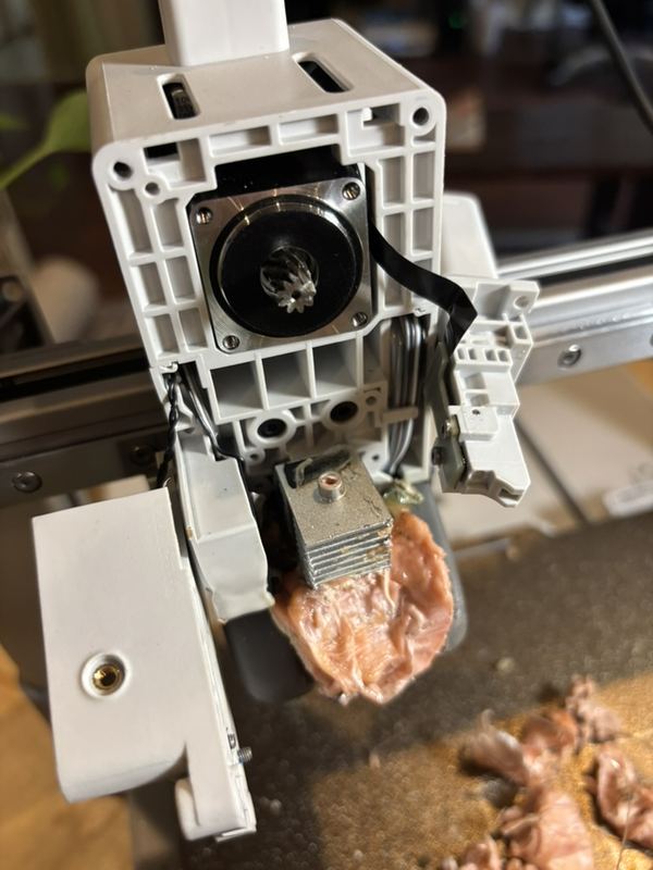 Melted filament wrapped around the whole hotend assembly